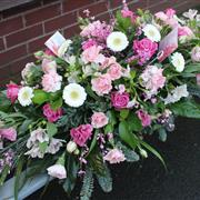 Coffin spray in pinks and whites