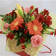 Petite arrangement in a bag