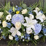 Blue and white hydrangea coffin spray