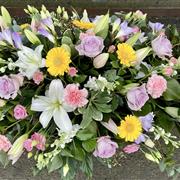 Pastel coffin spray