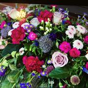 Cerise and purple coffin spray